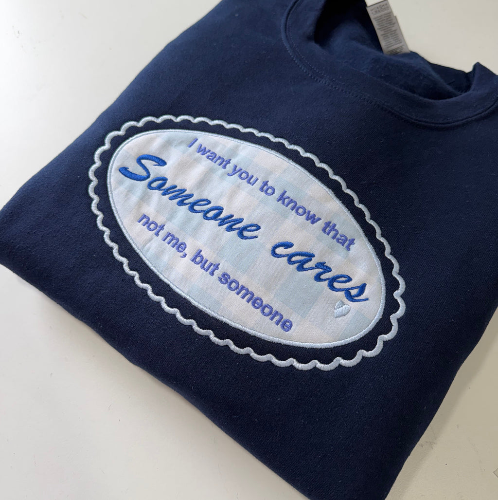 Someone Cares Embroidered Sweatshirt