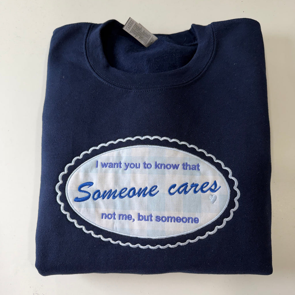 Someone Cares Embroidered Sweatshirt
