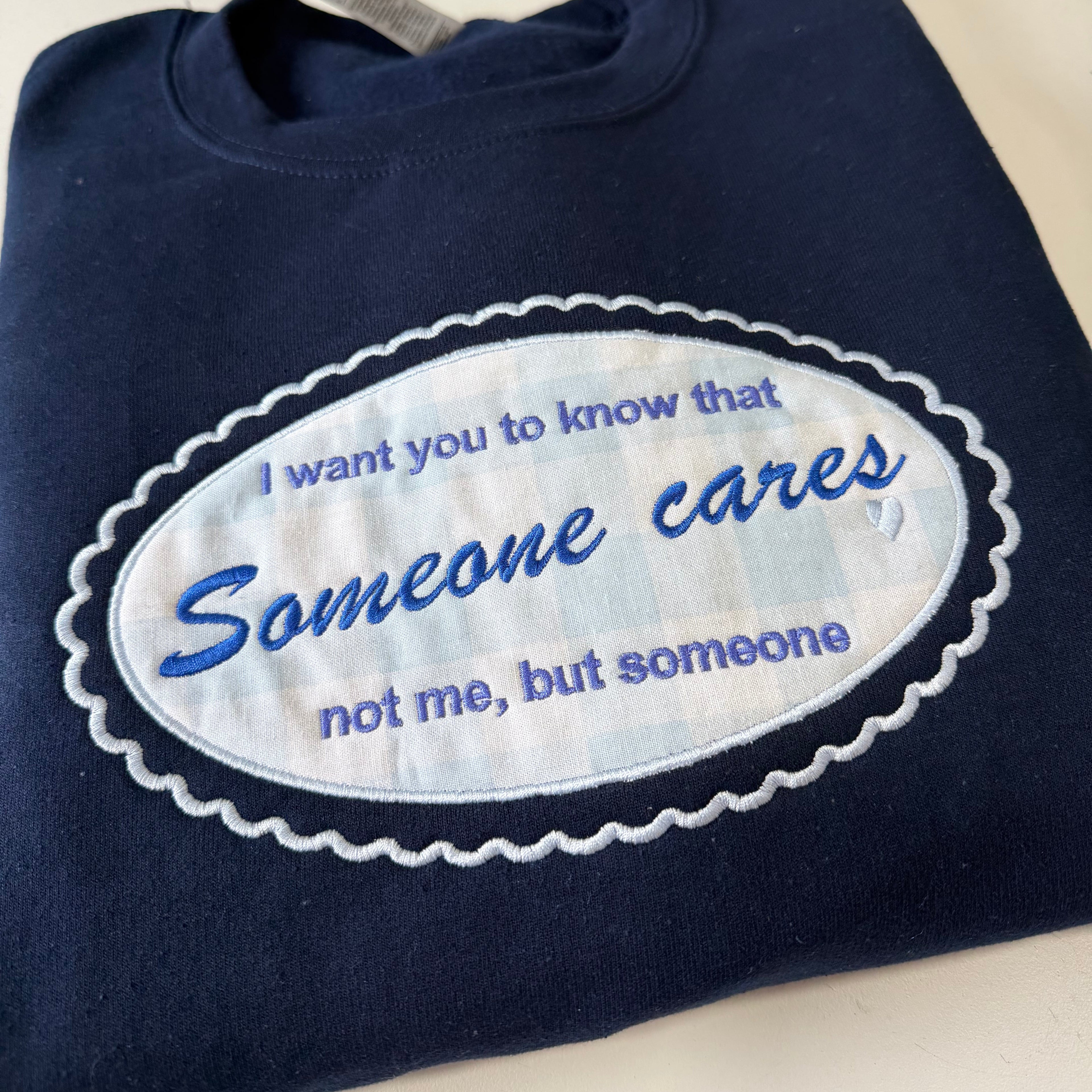 Someone Cares Embroidered Sweatshirt