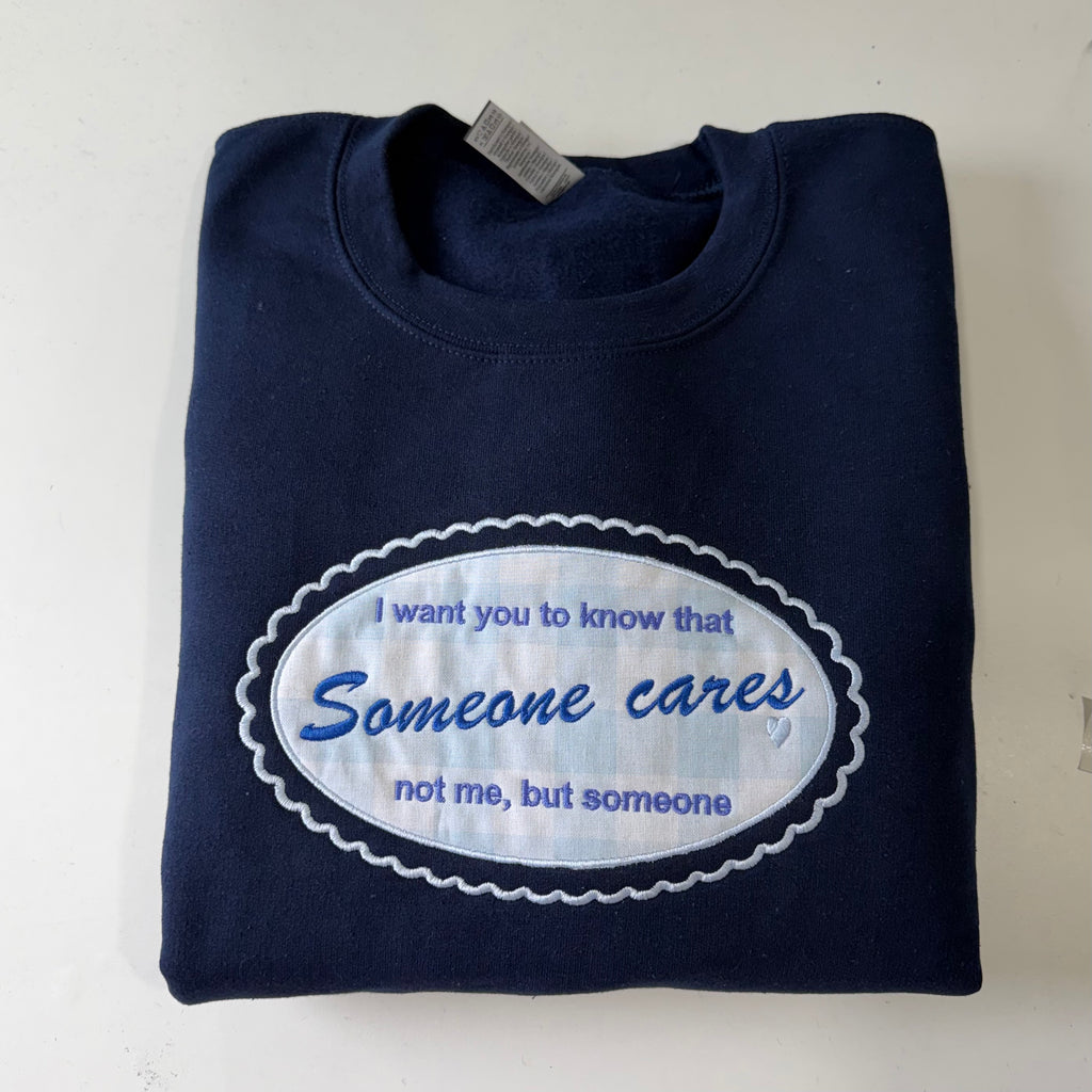 Someone Cares Embroidered Sweatshirt